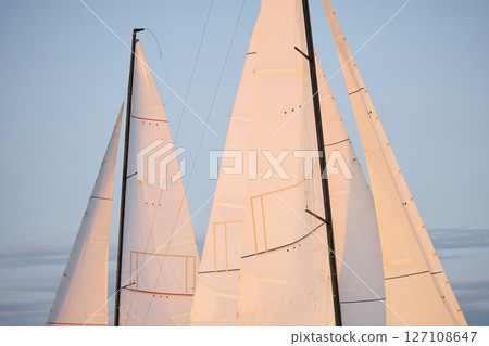 multiple sails at the sailing regatta in the Gulf of Finland at cloudy weather, hot race of several yachts, nobody multiple sails at the sailing regatta in the Gulf of Finland at cloudy weather, hot race of several yachts, nobody 127108647