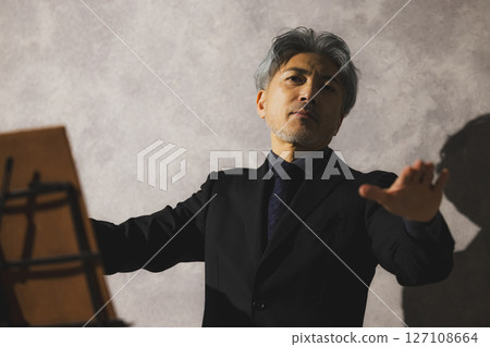 Conductor middle-aged man 127108664