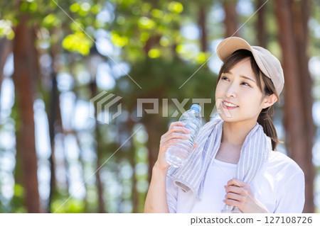 Women supplementing hydration Women supplementing hydration 127108726