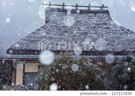 This photo was taken in Miyama-cho, Nantan-shi, Kyoto, in thatched roof village covered with snow. This photo was taken in Miyama-cho, Nantan-shi, Kyoto, in thatched roof village covered with snow. 127111656