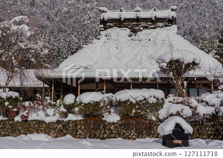 This photo was taken in Miyama-cho, Nantan-shi, Kyoto, in thatched roof village covered with snow. 127111718