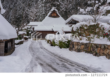 This photo was taken in Miyama-cho, Nantan-shi, Kyoto, in thatched roof village covered with snow. 127111724