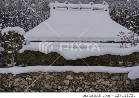 This photo was taken in Miyama-cho, Nantan-shi, Kyoto, in thatched roof village covered with snow. 127111725