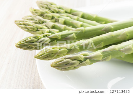 Fresh and delicious green asparagus 127113425