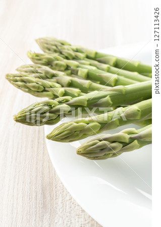 Fresh and delicious green asparagus 127113426