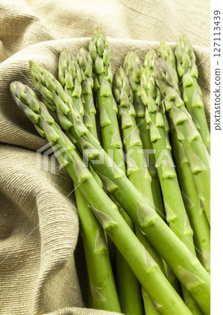 Fresh and delicious green asparagus 127113439