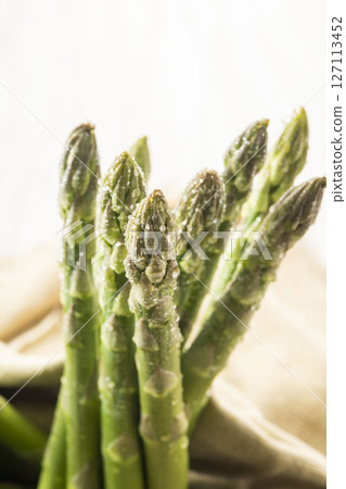 Fresh and delicious green asparagus 127113452