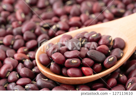 Close-up of black beans on a spoon Close-up of black beans on a spoon 127113610