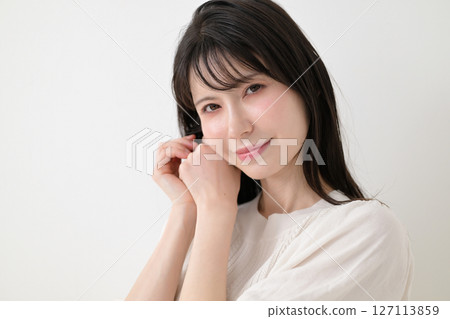 A woman with a smile A woman with a smile 127113859