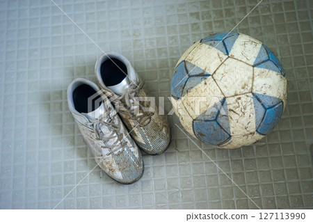 Soccer ball and soccer cleats stains Soccer ball and soccer cleats stains 127113990