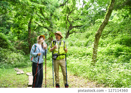 Hydration, heat stroke prevention, hiking, trekking, seniors, walking, mountain climbing Hydration, heat stroke prevention, hiking, trekking, seniors, walking, mountain climbing 127114360