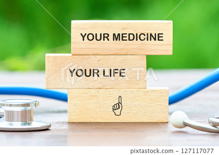 The conceptual phrase is YOUR MEDICINE YOUR LIFE. Invest in your health Concept. 127117077