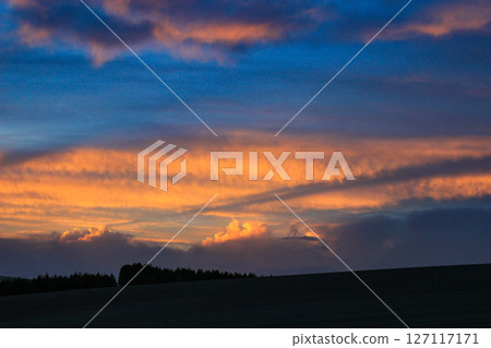 A vanishing contrail in the beautiful spring evening sky A vanishing contrail in the beautiful spring evening sky 127117171