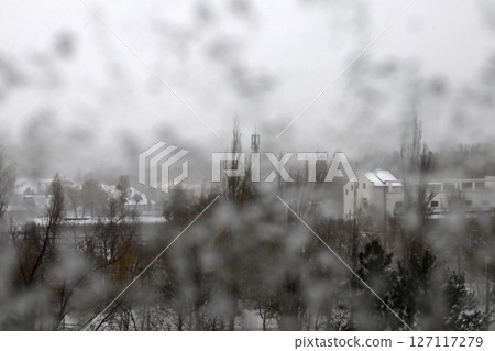 On a snow day, splashes on the window. 127117279