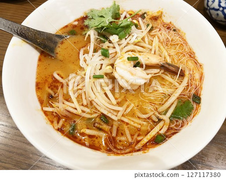Delicious tom yum noodles (Thai food) Delicious tom yum noodles (Thai food) 127117380