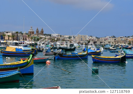 Republic of Malta, Malta island, Marsaxlokk, colorful fishing boat Lutz, Church of Our Lady of Pompei Republic of Malta, Malta island, Marsaxlokk, colorful fishing boat Lutz, Church of Our Lady of Pompei 127118769