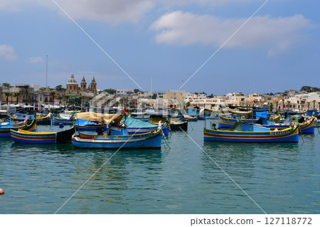 Republic of Malta, Malta island, Marsaxlokk, colorful fishing boat Lutz, Church of Our Lady of Pompei Republic of Malta, Malta island, Marsaxlokk, colorful fishing boat Lutz, Church of Our Lady of Pompei 127118772