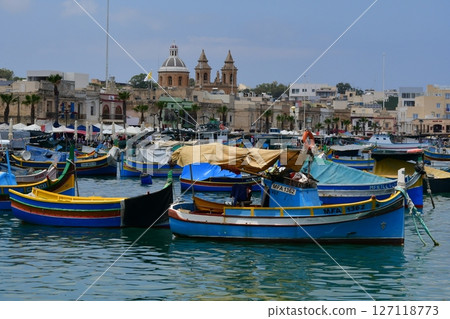 Republic of Malta, Malta island, Marsaxlokk, colorful fishing boat Lutz, Church of Our Lady of Pompei Republic of Malta, Malta island, Marsaxlokk, colorful fishing boat Lutz, Church of Our Lady of Pompei 127118773