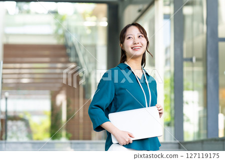 A young female engineer working in an office. Photo courtesy of Sky Perfect Tokyo Media Center. 127119175