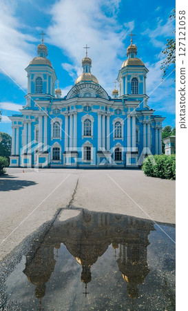 Panoramic view of St. Nicholas Naval Cathedral with beautiful reflection in water. Nikolo-Bogoyavlenskiy Morskoy Sobor built in 1762 in Saint Petersburg, Russia Panoramic view of St. Nicholas Naval Cathedral with beautiful reflection in water. Nikolo-Bogoyavlenskiy Morskoy Sobor built in 1762 in Saint Petersburg, Russia 127121058
