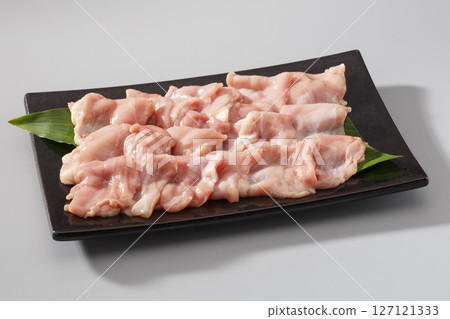 Raw chicken skirt meat on a plate 127121333