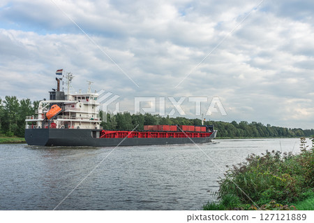 Cargo ship on Kiel Canal, Hochdonn, Schleswig-Holstein, Germany 127121889