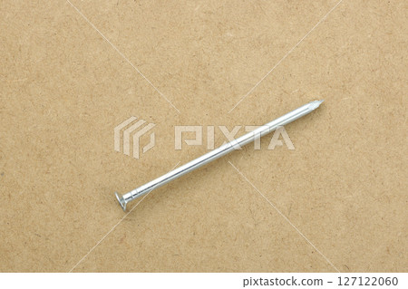 Nails placed on MDF board Nails placed on MDF board 127122060