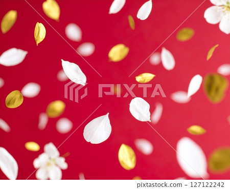 Fluttering cherry blossoms and golden petals 127122242