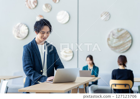 Engineers working in the office. Photo courtesy of Sky Perfect Tokyo Media Center. Engineers working in the office. Photo courtesy of Sky Perfect Tokyo Media Center. 127123706