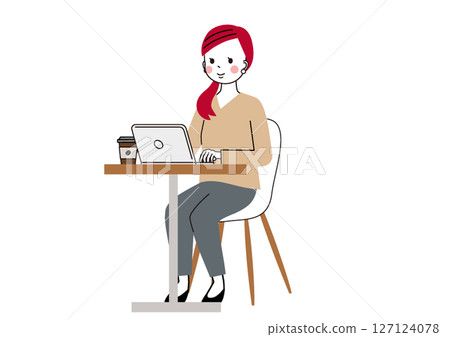 一位女士在咖啡桌旁使用筆記型電腦工作 127124078