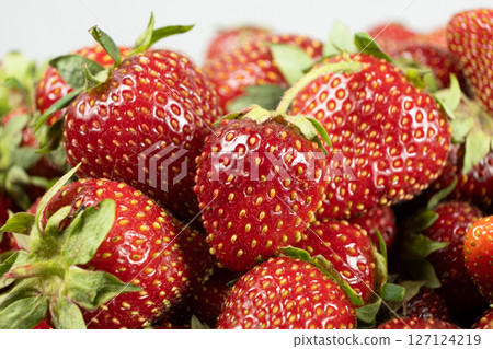 Ripe strawberries background. Sweet seasonal fruit concept. 127124219