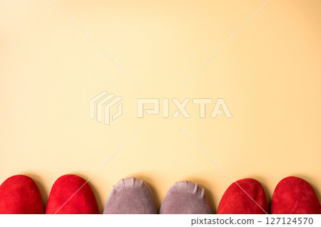 Colorful ballet flats arranged in a row on pastel background. 127124570