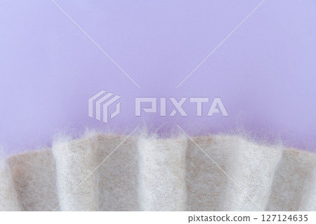 Soft white mohair wool fabric with purple background and pleats 127124635