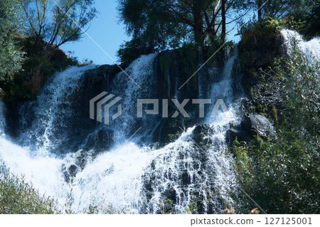 waterfall in Armenia surrounded by greenery waterfall in Armenia surrounded by greenery 127125001