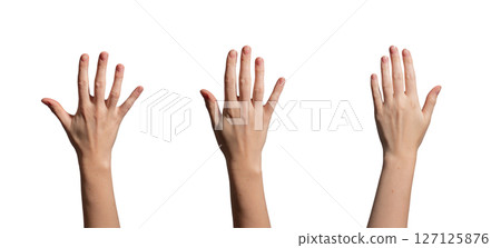 Hand raised with fingers spread, showcasing an elegant, graceful gesture. Clean, smooth skin with a 127125876