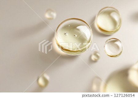 Image of beige oil floating in space 127126054
