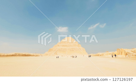 Tourists visiting the majestic step pyramid of djoser in saqqara, egypt Tourists visiting the majestic step pyramid of djoser in saqqara, egypt 127126197