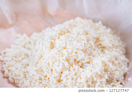 Mochi rice soaked in water overnight Mochi rice soaked in water overnight 127127747