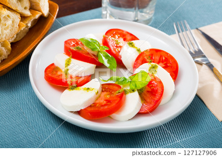 Appetizing salad with young white cheese Appetizing salad with young white cheese 127127906