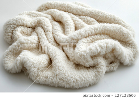Alpaca wool throw blanket on a white background. For minimalist luxury living room. 127128606