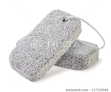 Two pumice stones close-up on a white. Isolated Two pumice stones close-up on a white. Isolated 127129568
