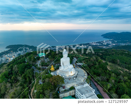 Aerial View drone shot of Big Buddha Statue on the high mountain at Phuket thailand in evening time. Aerial View drone shot of Big Buddha Statue on the high mountain at Phuket thailand in evening time. 127129597
