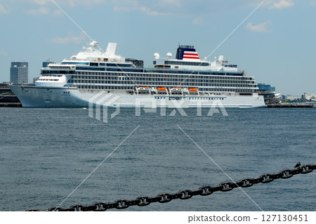The new passenger ship Asuka III, docked at Osanbashi Pier in Yokohama Port, its port of registry, prior to the start of its commercial voyage. 127130451