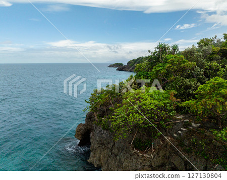 Tropical Island with rocky coastline. Carabao Island. Romblon, Philippines. Tropical Island with rocky coastline. Carabao Island. Romblon, Philippines. 127130804