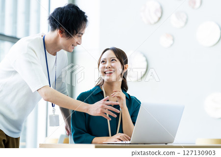 Engineers working in the office. Photo courtesy of Sky Perfect Tokyo Media Center. Engineers working in the office. Photo courtesy of Sky Perfect Tokyo Media Center. 127130903