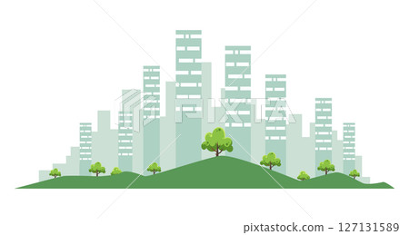 A shadowy silhouette of a city skyline with trees in front 127131589