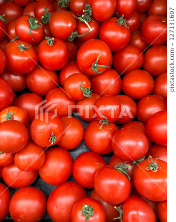 lots of ripe tomato for food as background 127131607