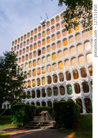 Facade of prefabricated modular concrete on the functionalist office CBR Building, Watermael-Boitsfort, Bussels, Belgium Facade of prefabricated modular concrete on the functionalist office CBR Building, Watermael-Boitsfort, Bussels, Belgium 127131910