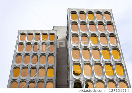 Facade of prefabricated modular concrete on the functionalist office CBR Building, Watermael-Boitsfort, Bussels, Belgium 127131914