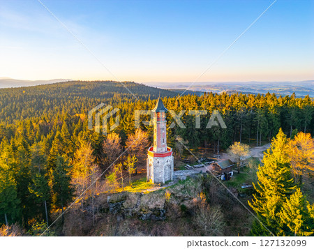 Spring morning light bathes Stepanka Lookout Tower in Korenov, Czechia. 127132099
